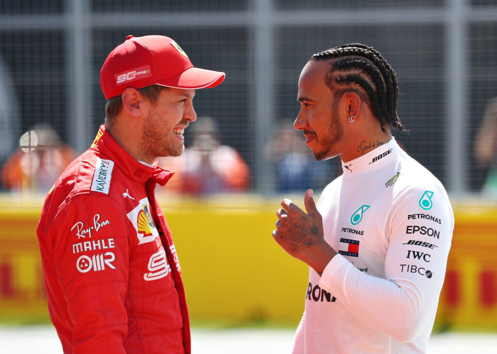 Lewis Hamilton and Sebastian Vettel chatting at the Canadian Grand Prix.