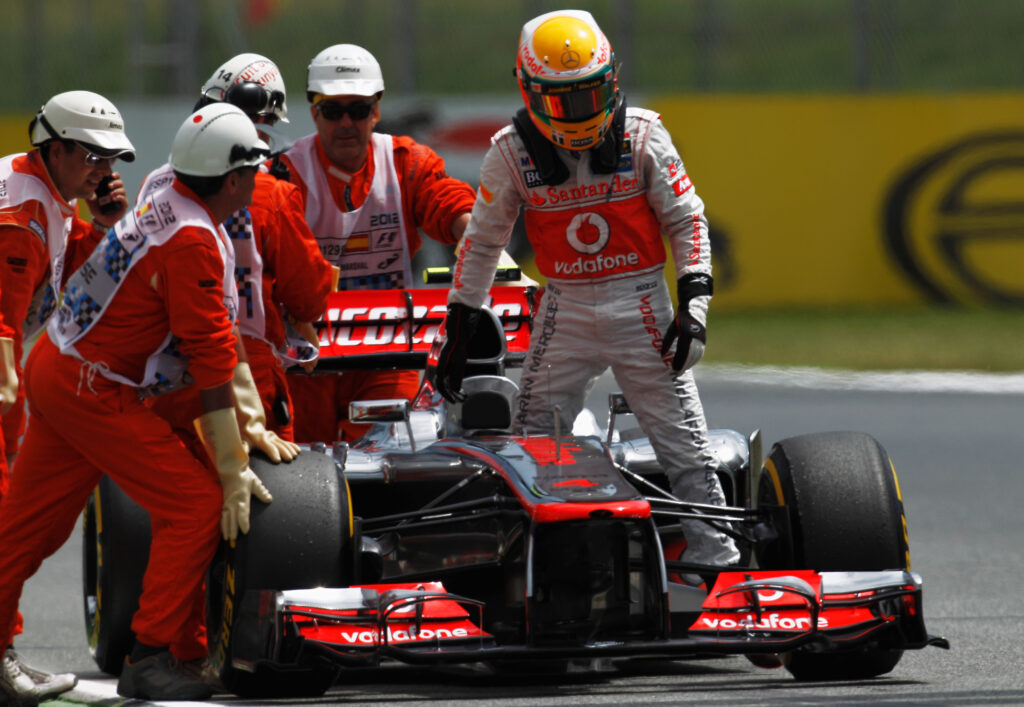 McLaren driver Lewis Hamilton stops and is excluded from qualifying after taking pole for the 2012 F1 Spanish Grand Prix