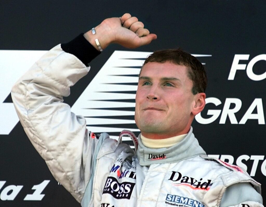 McLaren driver David Coulthard celebrating at the 2000 British Grand Prix