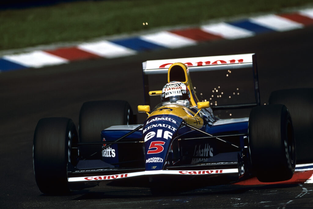 Nigel Mansell driving his Williams FW14 in Germant